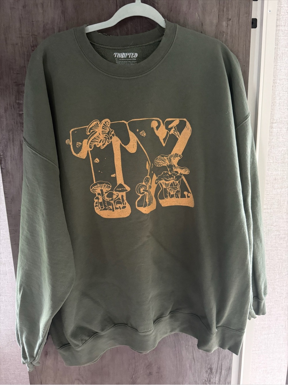 LivyLu Texas Olive Green Crewneck Sweatshirt with Yellow Mushroom Graphic